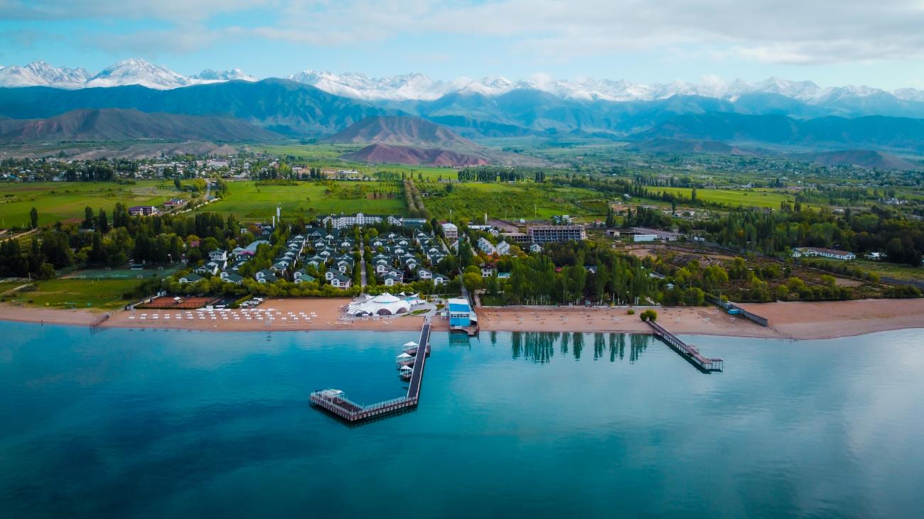 Issyk-Kul lake resort aerial view with Tian Shan mountains